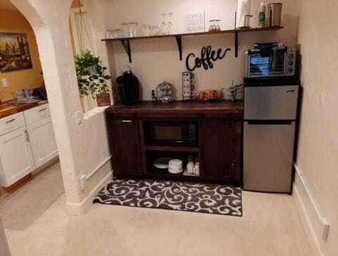 Fridge, microwave, coffee/tea maker, toaster