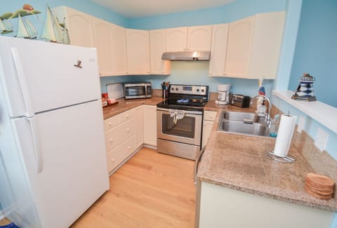 Discover culinary delights in our stylish and functional kitchen space. 🍽️✨