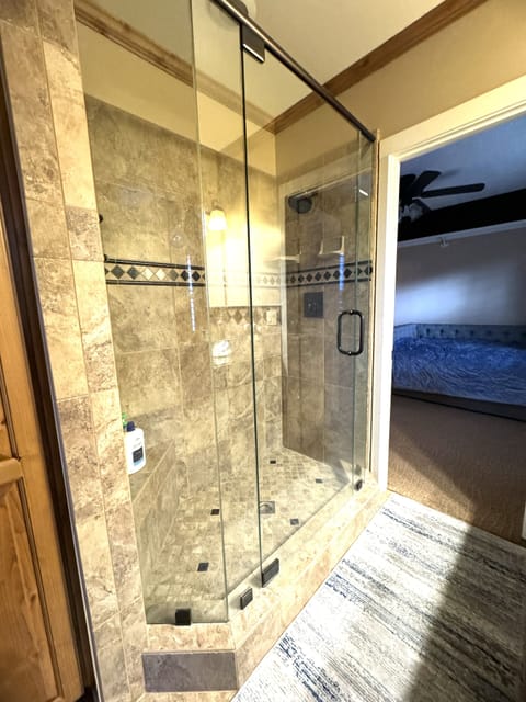 Shower, jetted tub, towels, soap