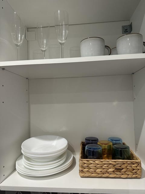 Fridge, microwave, cookware/dishes/utensils, spices