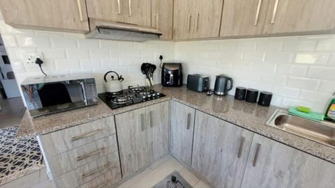 Fridge, microwave, stovetop, electric kettle