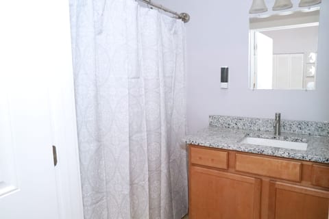 Combined shower/tub, hair dryer, towels, soap