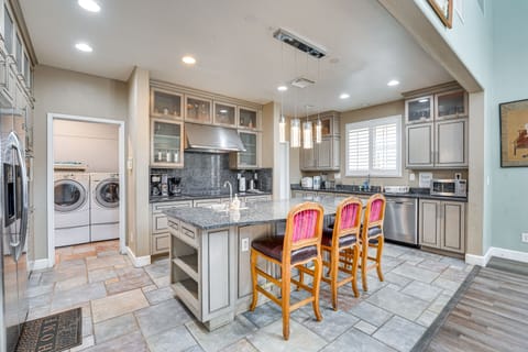 Fridge, stovetop, dishwasher, coffee/tea maker