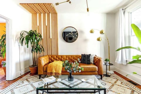 jungle-inspired living room with real plants & earthy tones a cozy retreat in the heart of columbus!