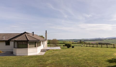Overthickside Cottage - rear aspect of the property with fabulous countryside views as a backdrop