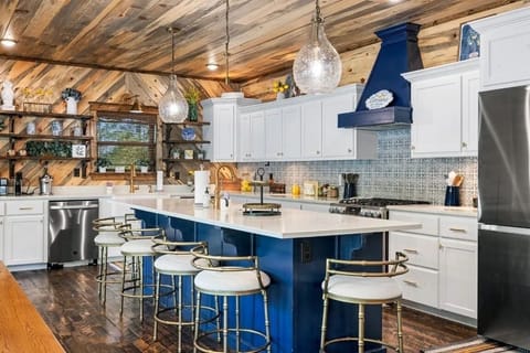 Create lasting memories in our cabin kitchen as friends and family gather around the island for drinks and lively conversation