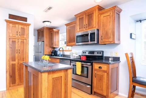 Whip up a delicious meal in the fully equipped kitchen - the heart of your cozy condo that's sure to inspire your inner chef!