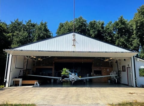 What The Hangar looked like when used as an actual hangar. Now a living space!
