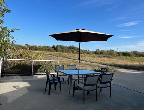 Enjoy a meal or a cup of coffee on the patio! Maybe see an airplane come or go!