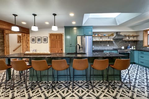 Kitchen with counter dining.