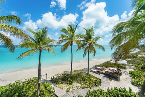 On the beach, sun loungers, beach towels