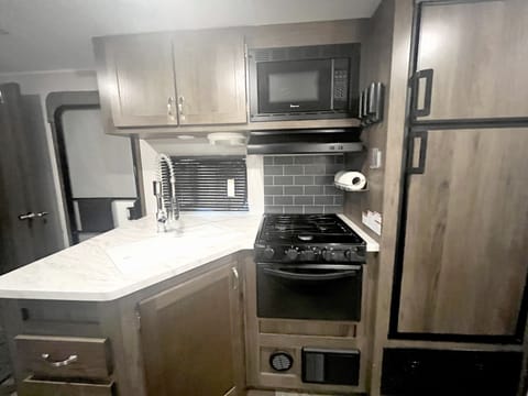 Fridge, microwave, oven, cookware/dishes/utensils