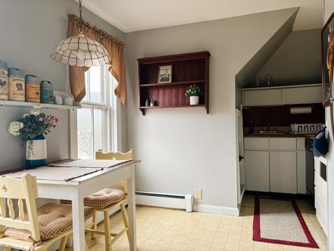 3rd floor kitchenette includes a dishwasher, stove, microwave and refrigerator.