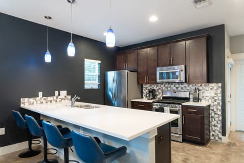 Fully Equipped Kitchen with Bar Seating