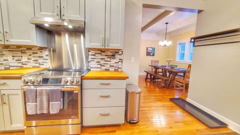 The kitchen is connected to the dinning areas and living room.