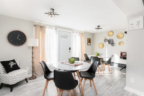 Enjoy company of friends and family every meal. The dining area opens out to the patio and backyard