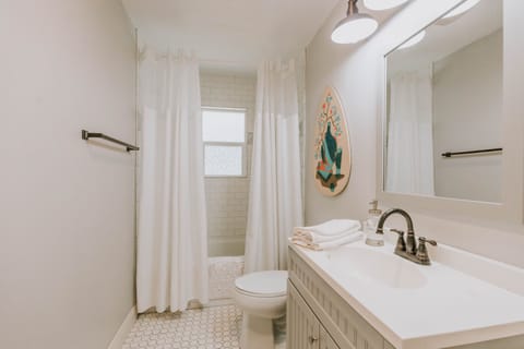 Combined shower/tub, hair dryer, towels, soap