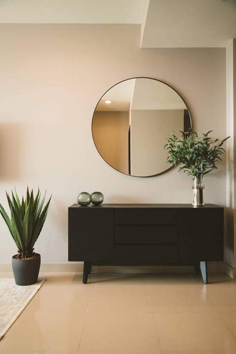 The apartment exudes a captivating ambiance with its cozy and elegant decor.