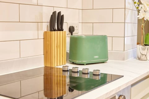 Amidst a symphony of stainless steel and cutting-edge appliances,