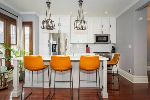 Prepare to be inspired in this gourmet kitchen. Featuring brand-new GE appliances and a sleek gas stove top, this culinary haven invites you to create memorable meals with ease.