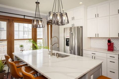 Welcome to Crestview Casa, where classic charm meets modern elegance. Nestled in the heart of Clintonville, this stunningly remodeled home invites you to indulge in luxury. Step into a custom-designed kitchen, perfect for culinary adventures.