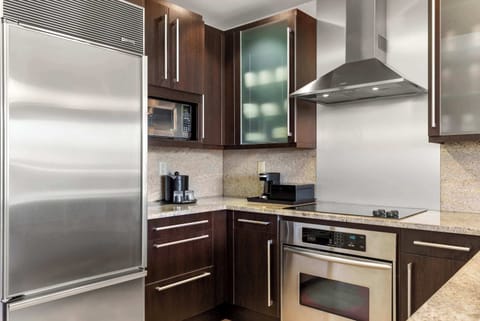Full kitchen with stainless steel appliances