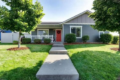 Here's our cute BeeCozy Cottage tucked in lovely neighborhood.