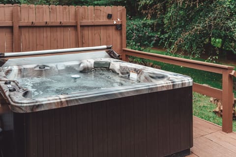 Enjoy time in our hot tub located on the back patio - perfect after a fun day in Hocking Hills!
