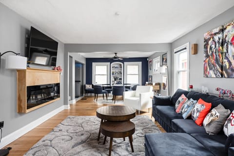 An Ultra HD Samsung TV, Electronic fireplace makes a great space for an evening