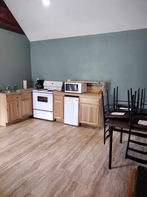 Microwave, stovetop, dining tables