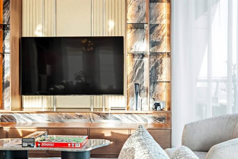 Living Room: Elegant decor and entertainment await in this stylish space for unforgettable moments!