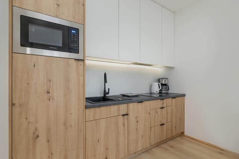 Kitchenette with a dishwasher