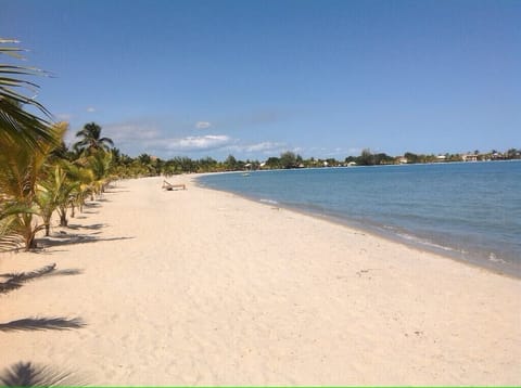 On the beach, sun loungers, beach towels