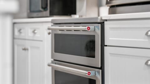 Kitchen with double electric oven.