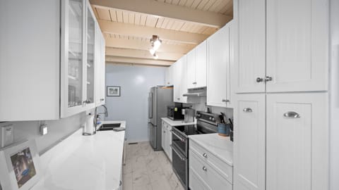 Kitchen with brand new appliances.