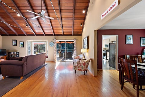 The living room opens to the dining room and back deck.