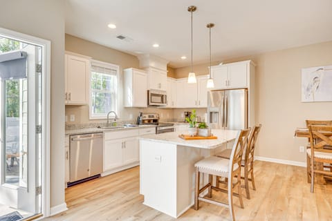 Fridge, stovetop, dishwasher, coffee/tea maker