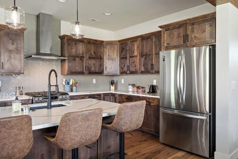 Fridge has inside water dispenser (and ice maker inside freezer).