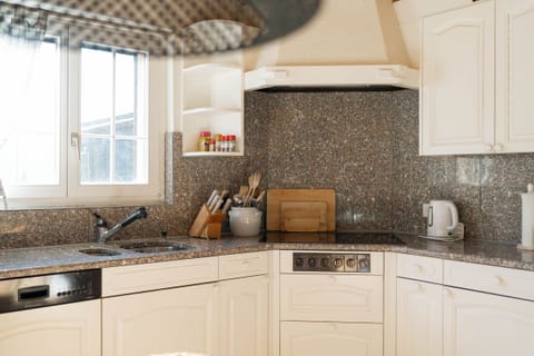 The kitchen offers enough space to indulge in culinary delights