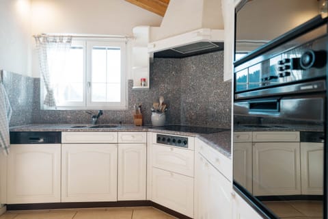 There is a oven in the kitchen