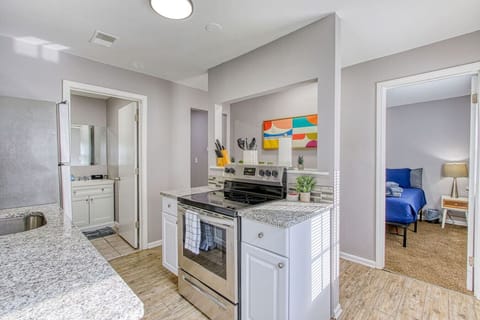 You’ll love the convenience of this fully equipped kitchen, where you can brew coffee, cook meals, or prepare snacks. The cozy layout and warm ambiance make cooking here a delightful part of your stay.