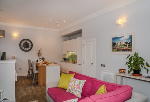 Splashes of colour in the sitting area leading to the kitchen and dining areas