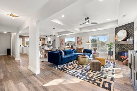 Living room w/electric fireplace & smart tv. Plenty of games as well.