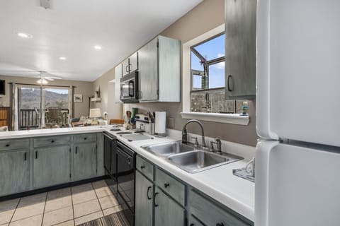 Our kitchen sink with a window makes dish duty a delight.