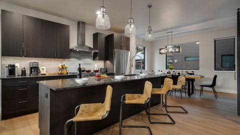 Gourmet kitchen with breakfast bar seating