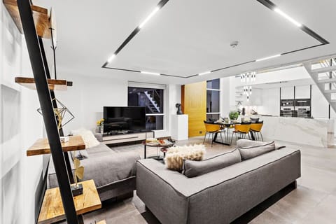 Living Room: Stylish design with modern amenities and inviting natural light for perfect relaxation!