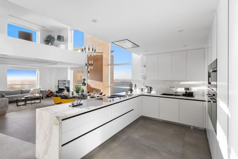 Gourmet Kitchen: Sleek design with stunning views, perfect for culinary adventures in Dubai!