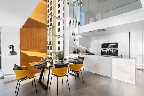 Dining Area: Bright space with modern decor, stylish seating, and stunning views—perfect for gatherings!