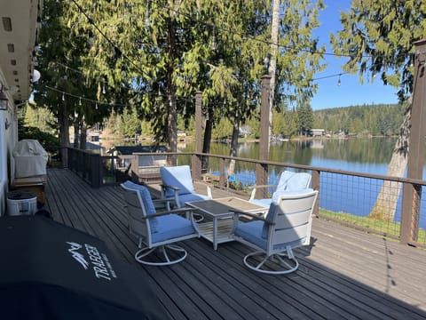 Deck off house close to kitchen, can sit and relax here all day. 