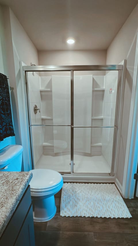 Combined shower/tub, hair dryer, towels, soap